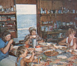 Allgood family in their stilt house